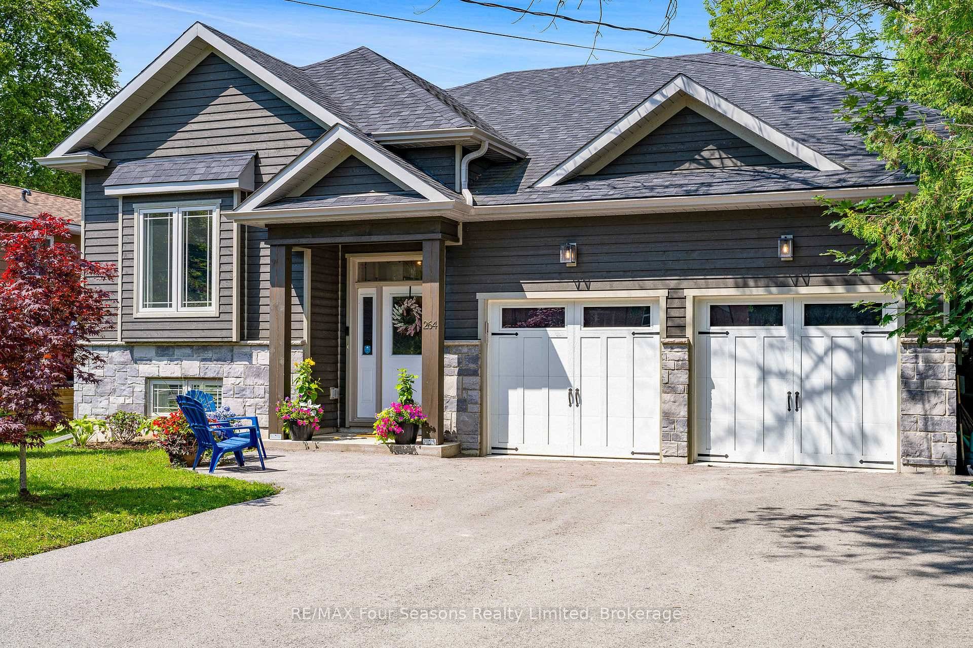 Welcome to this exceptional custom home in the charming, historic town of Meaford !