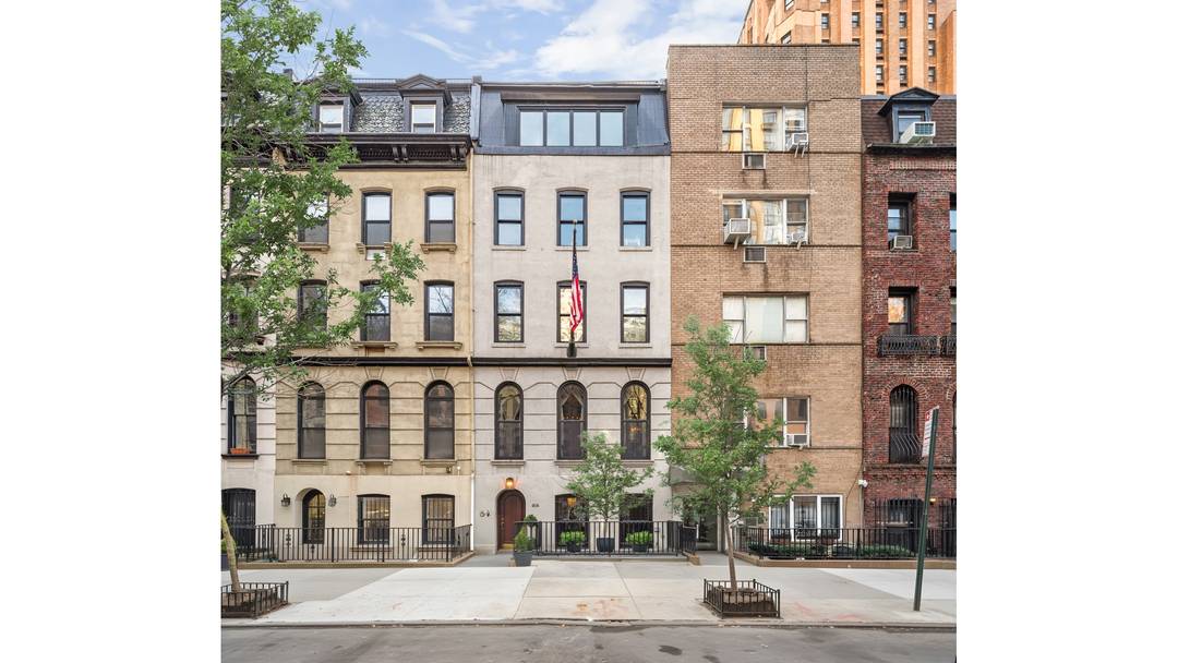 Built in 1910 and thoughtfully reimagined for modern living, this distinguished 20 foot wide, elevator townhouse seamlessly blends timeless architecture with contemporary sophistication.