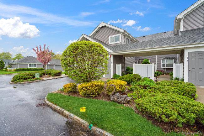 Welcome to 106 Midland Pond Ct, Moriches, a place where comfort meets style in the desirable Waterways gated community.