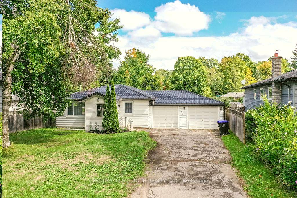Fully renovated turn key Bungalow situated on a large mature 60ft by 202ft fully fenced lot !