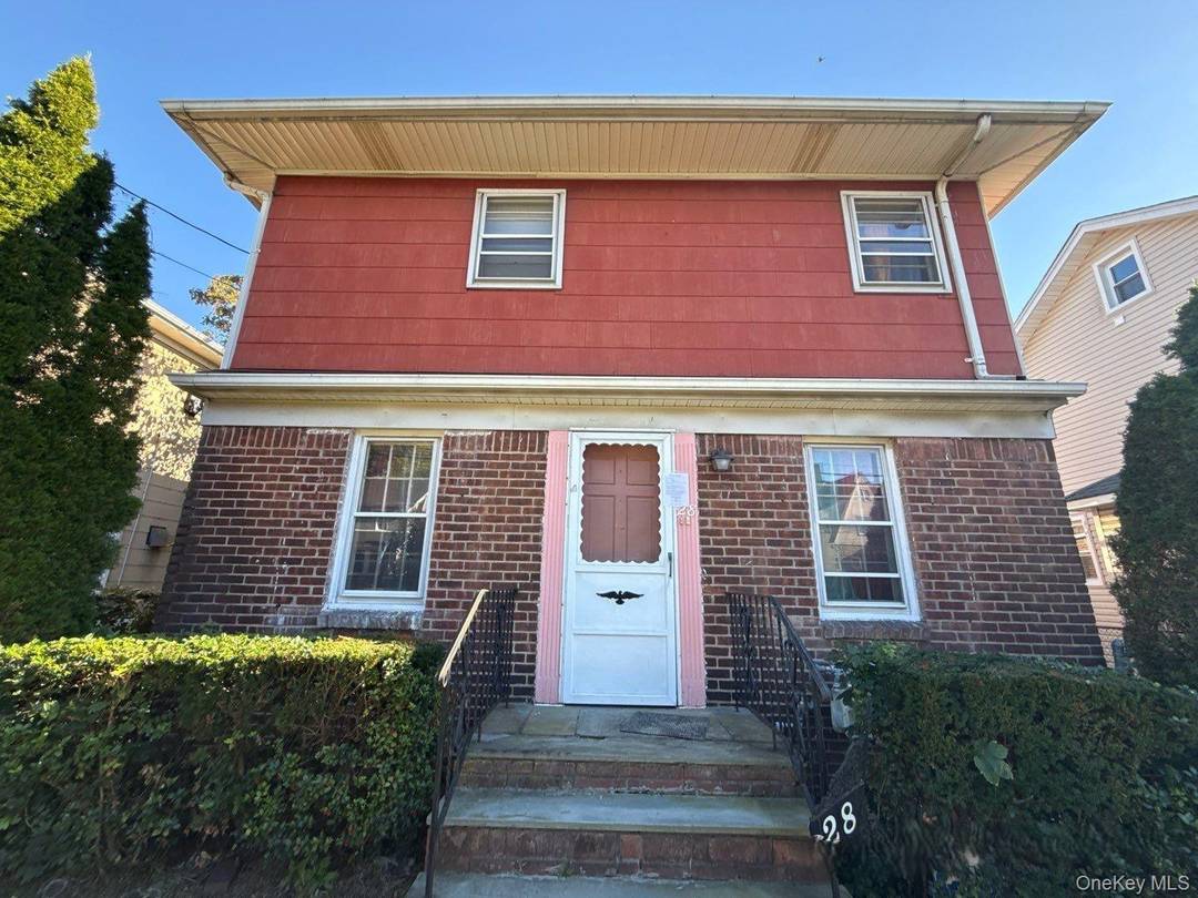 Colonial style home featuring 4 bedrooms, 2 full baths, a formal dining room, and a 1 car garage.