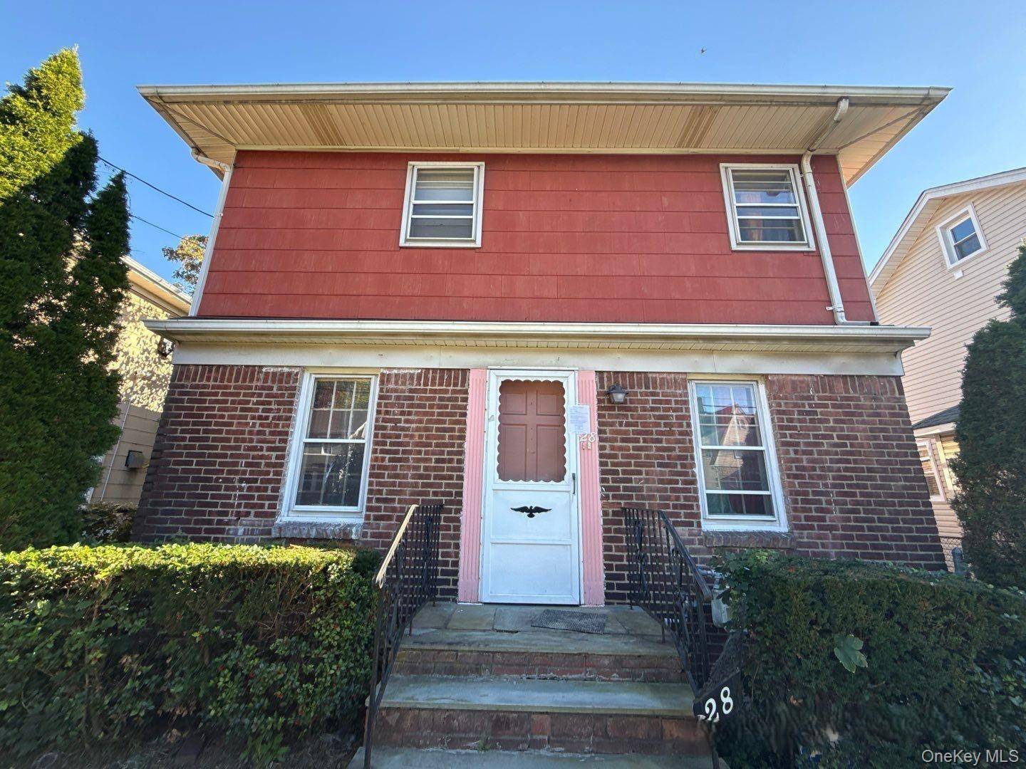 Colonial style home featuring 4 bedrooms, 2 full baths, a formal dining room, and a 1 car garage.
