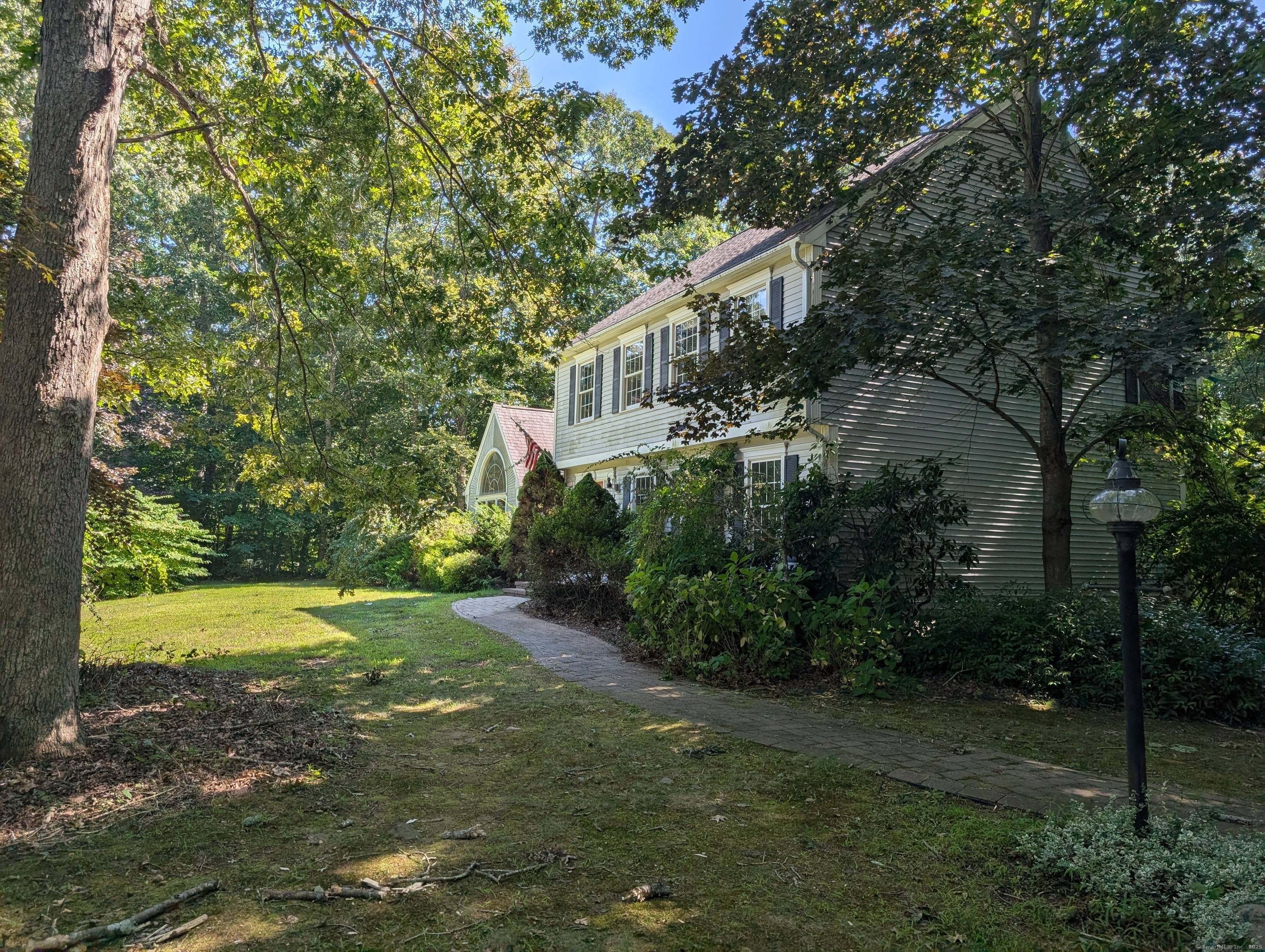 Charming colonial home nestled on 0.