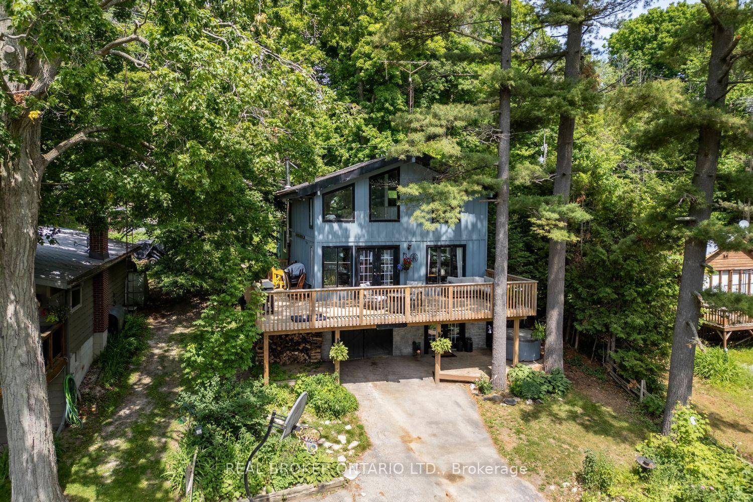 Welcome to your year round retreat in the exclusive, private community of Pine Point, nestled along the shores of Lake Scugog.