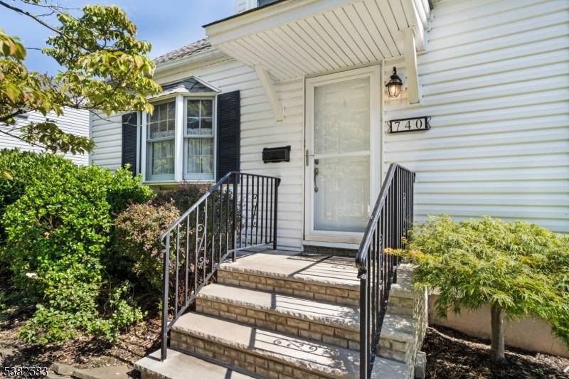 This charming four bedrooms, two baths Cape Cod style home is nestled on a quiet residential street and features mature landscaping and a picturesque exterior.