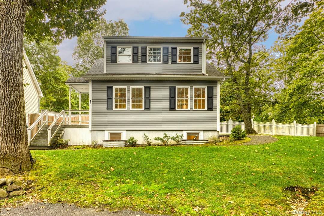 Just steps from the sand at Friendship Beach, this immaculate 3 bedroom or flex 4 bedroom home captures the best of North Shore living.