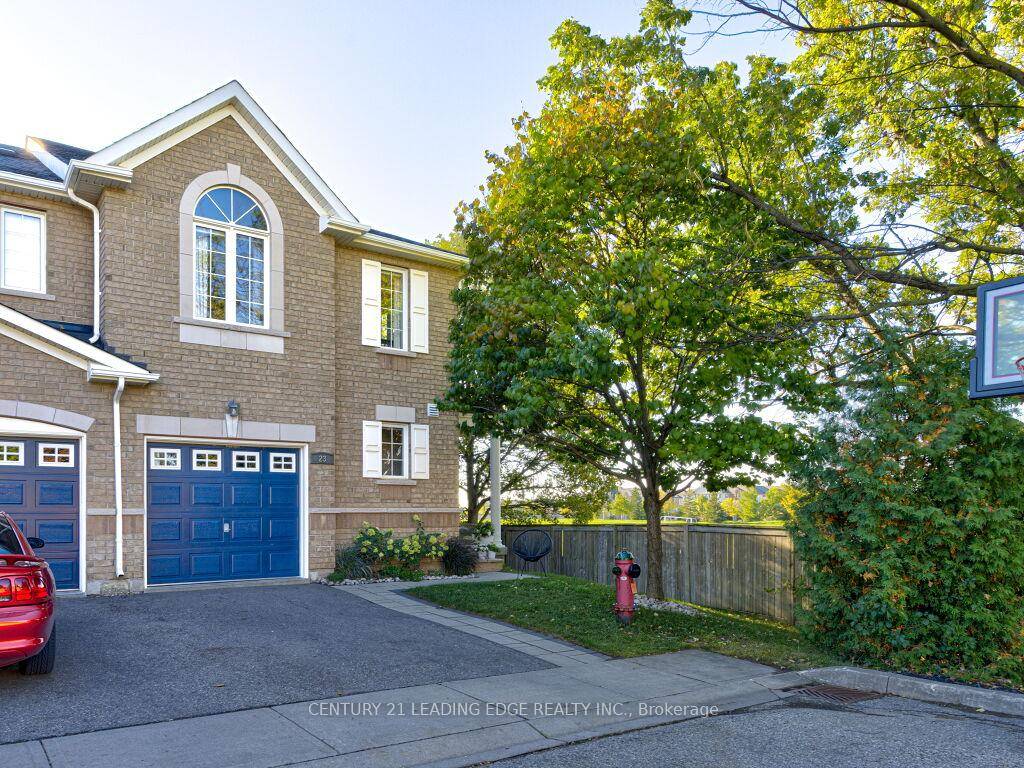 IMAGINE... a Rare end unit townhome on an oversized double lot, backing onto treed conservation land with no rear neighbours !