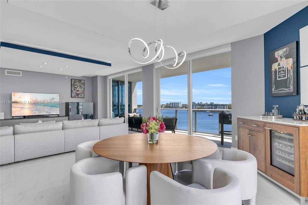 Experience refined waterfront living in this corner 2 bed den, 2.