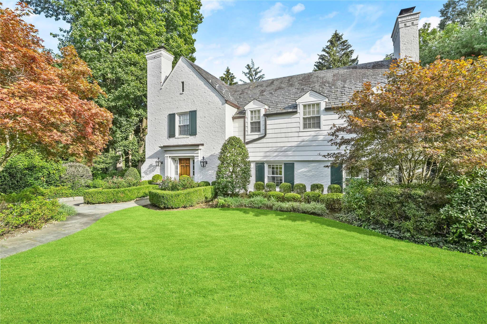 Totally renovated to the highest standards, 25 Moore Road is a pristine white brick Colonial located in the coveted Lawrence Park West area, just steps from Bronxville Village.
