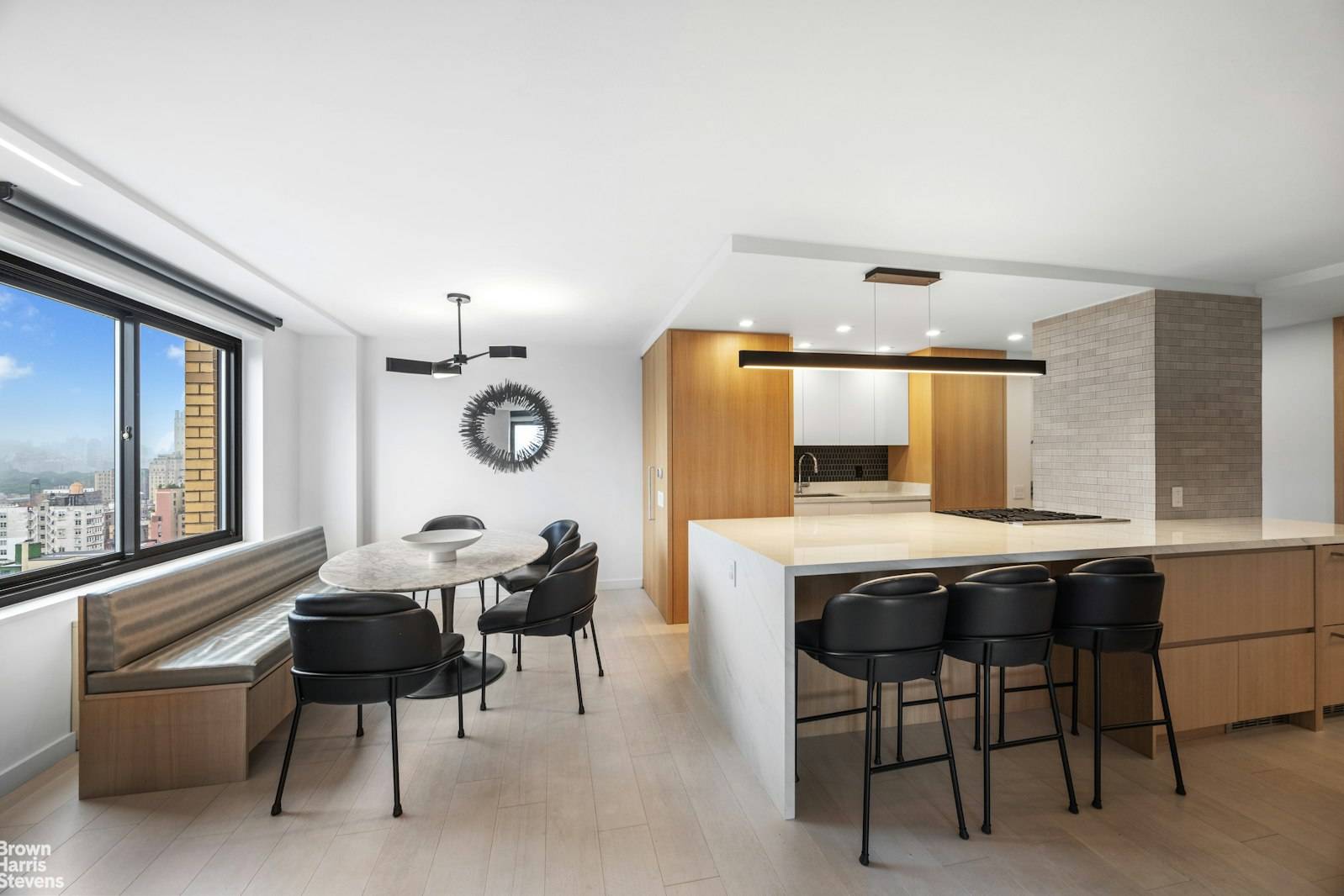 Welcome home to One Sherman Square, Residence 24B, where high design meets high altitude.