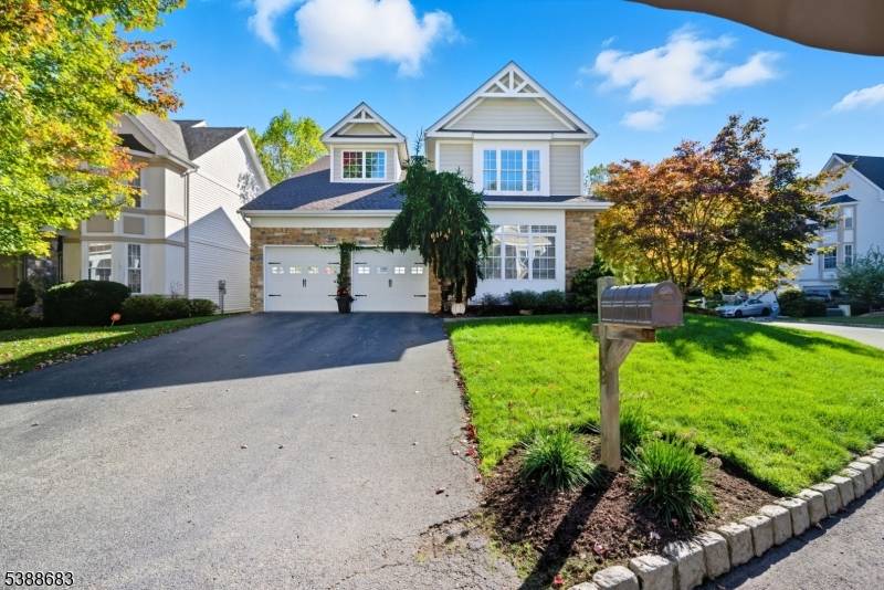 Nestled on a corner property in a cul de sac, this home offers both privacy and curb appeal, enhanced by a stone walkway leading from the driveway to the front ...