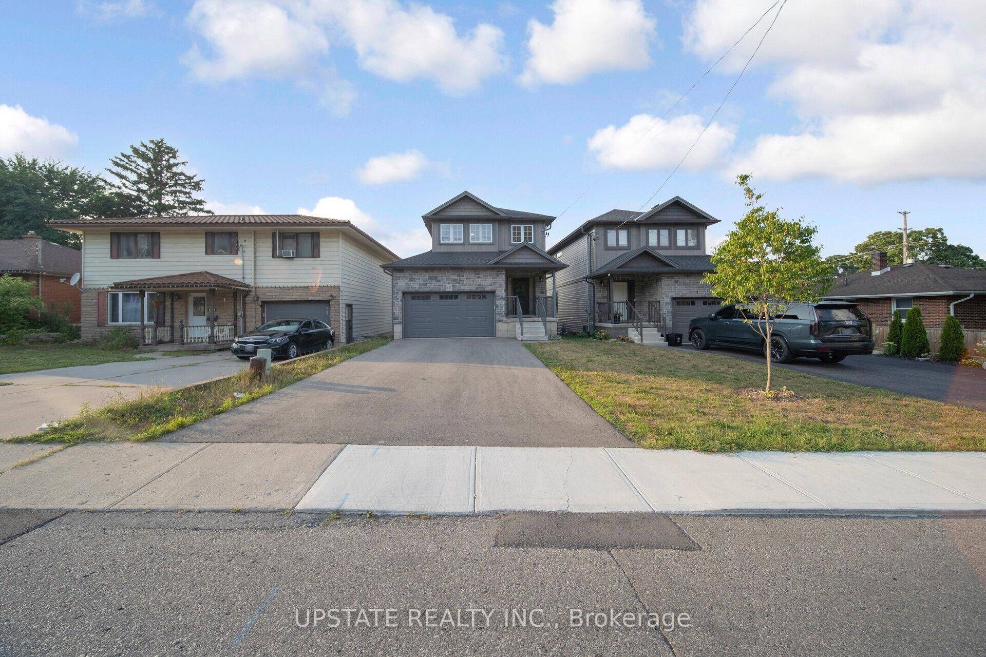 MUST SEE ! Offering luxury, connectivity, amp ; convenience Welcome to 457 Spencer, 2022 built, double car garage detached featuring 3 bed 4 bath approx 2119 sqft total w finished ...