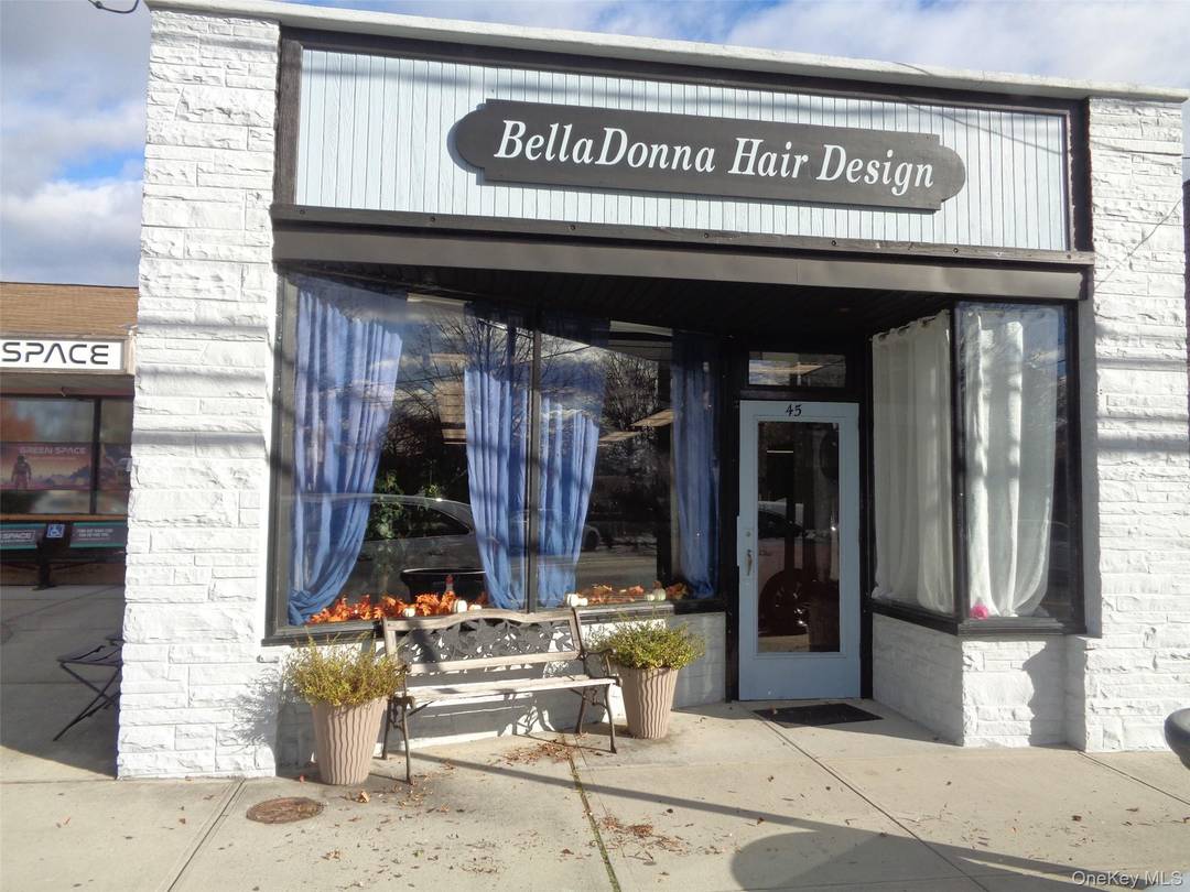 Welcome to a prime commercial gem nestled in the bustling heart of Downtown Rocky Point !