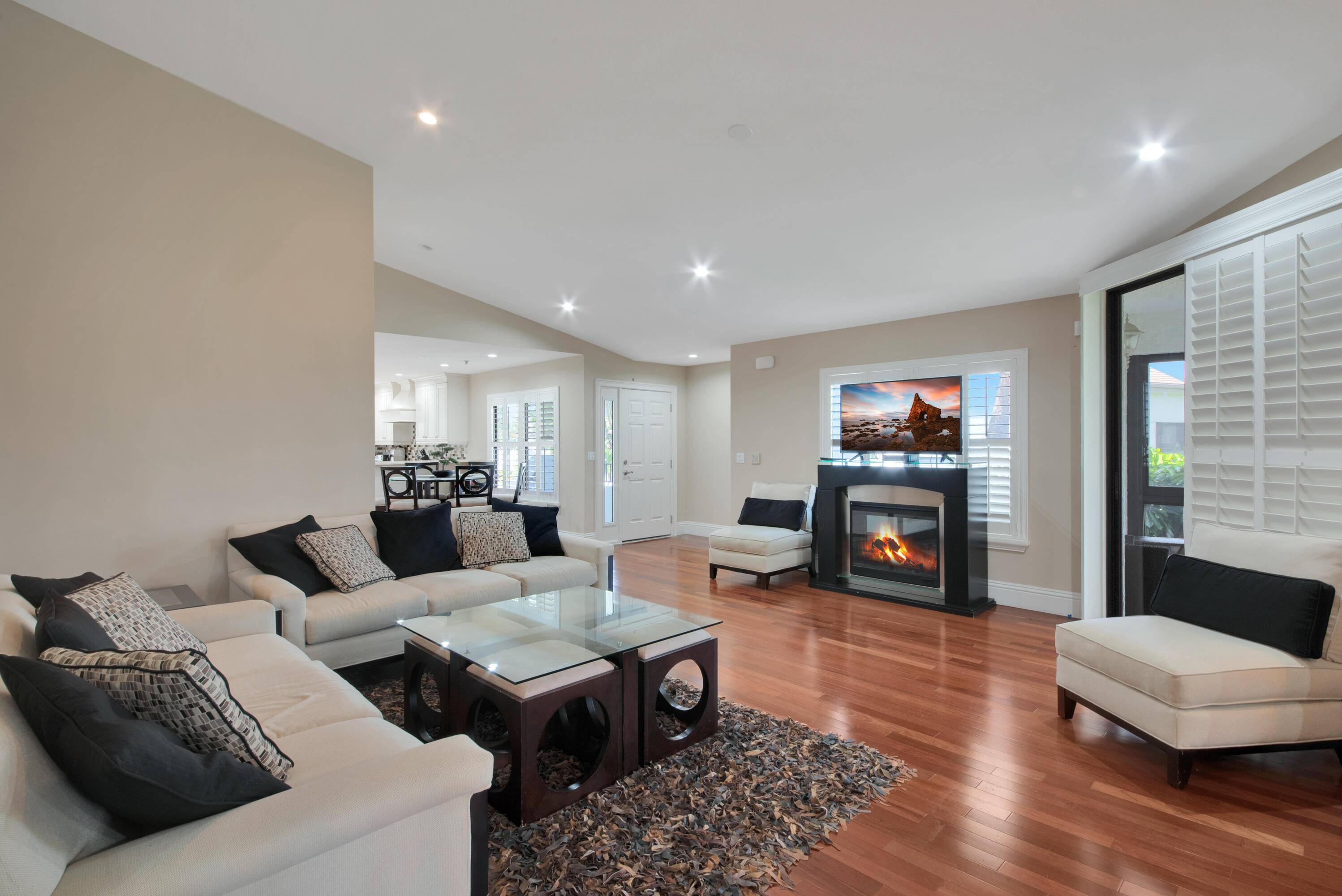 This remodeled unit features open gourmet granite countertop kitchen with built in oven, and top of the line appliances.