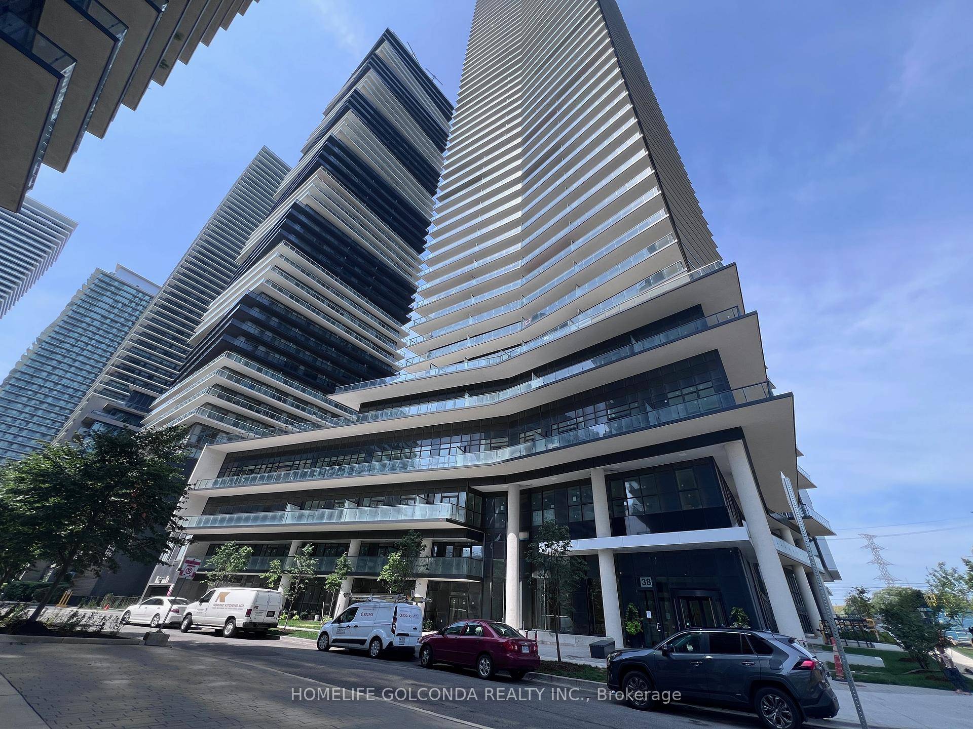 brand new, stylish waterfront condo a rare corner unit with breathtaking North East lake and city views !