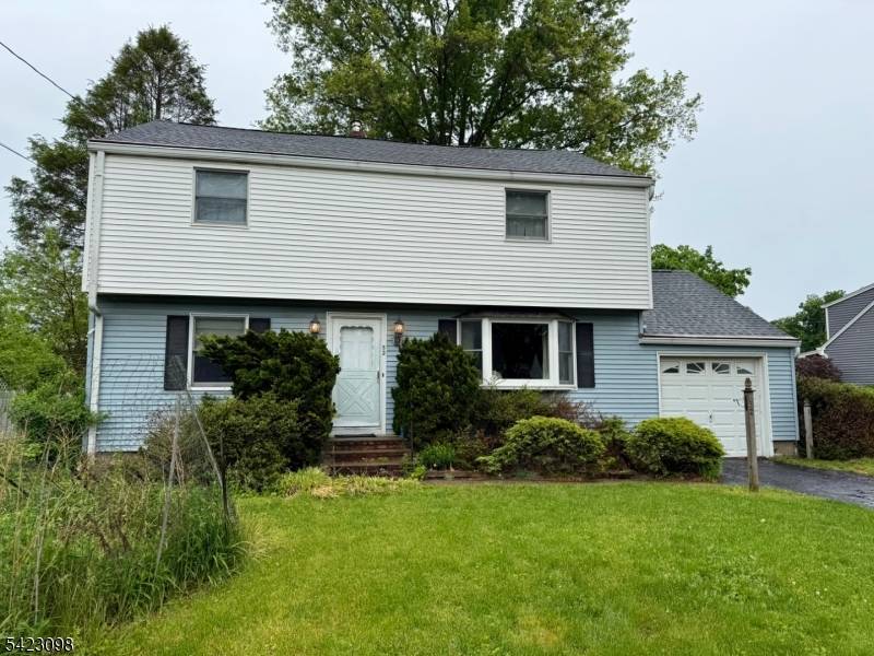 Well loved 5 bedroom Colonial situated on a spacious.