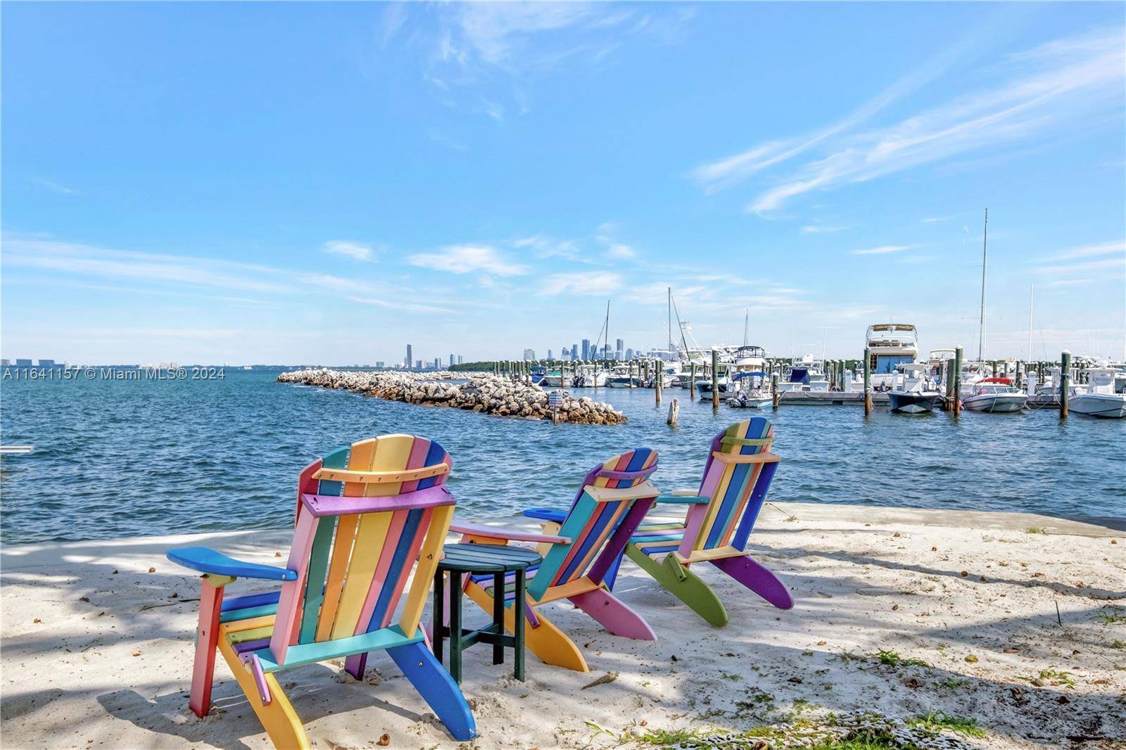 Experience island living in this stunning 4 bedroom, 4 bathroom home on one of Key Biscayne's most coveted lots.