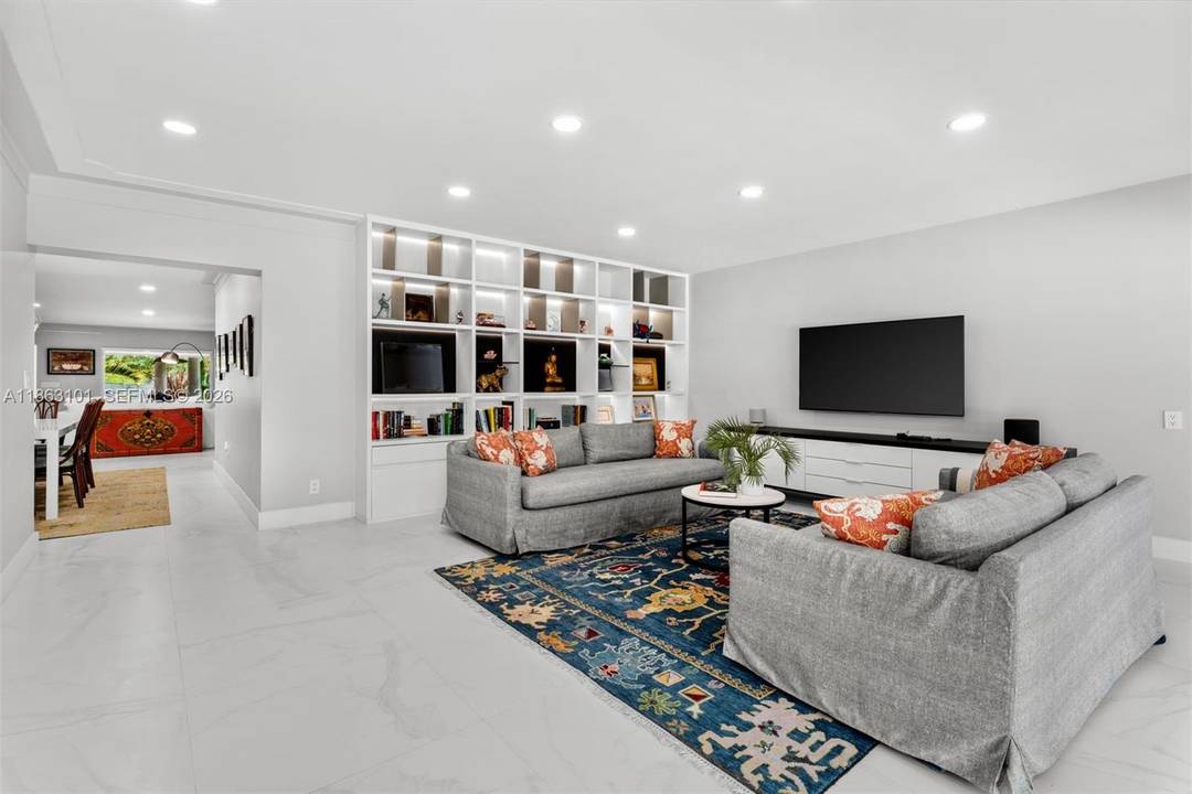 This charming waterfront gem sits on guard gated Biscayne Point perfectly situated just minutes from the beach, restaurants and shops of the world class Bal Harbour.