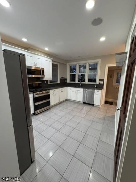 Welcome to this spacious first floor 3 bedroom, 2.