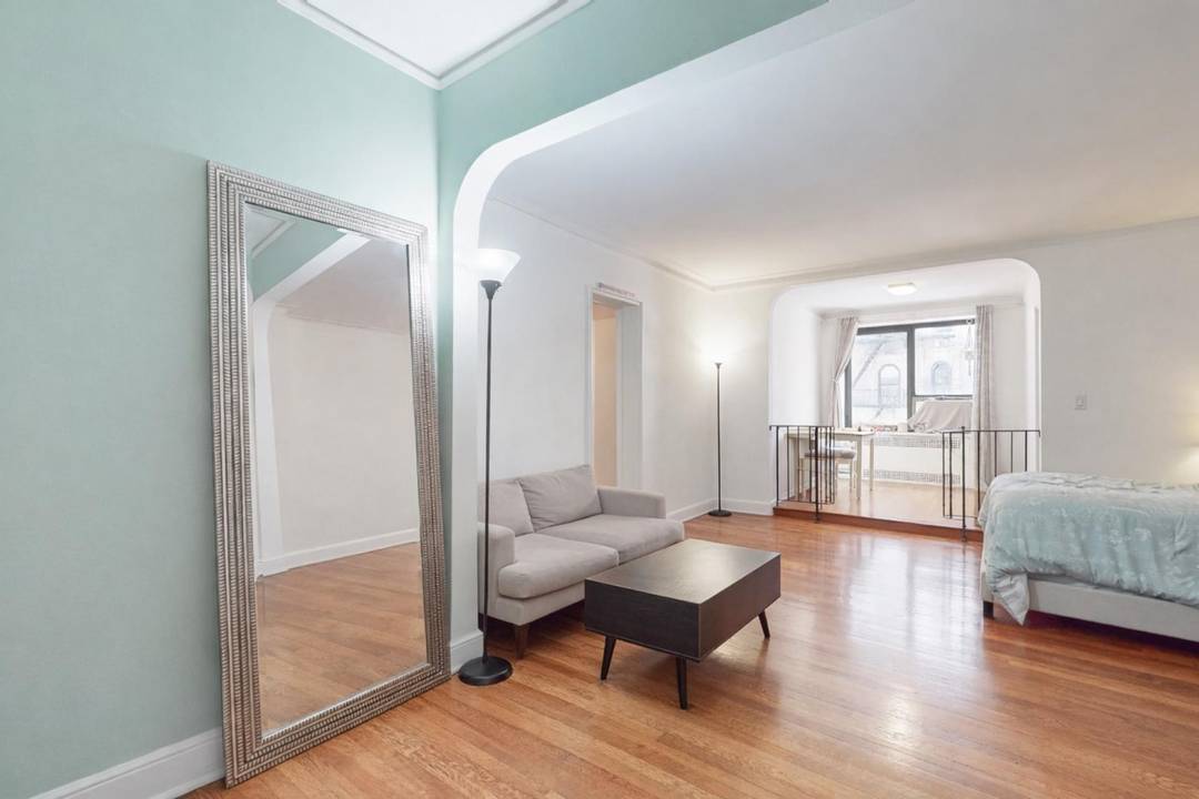 Tastefully designed studio condo with south facing windows and a functional layout allowing for distinct living, sleeping, and home office areas.