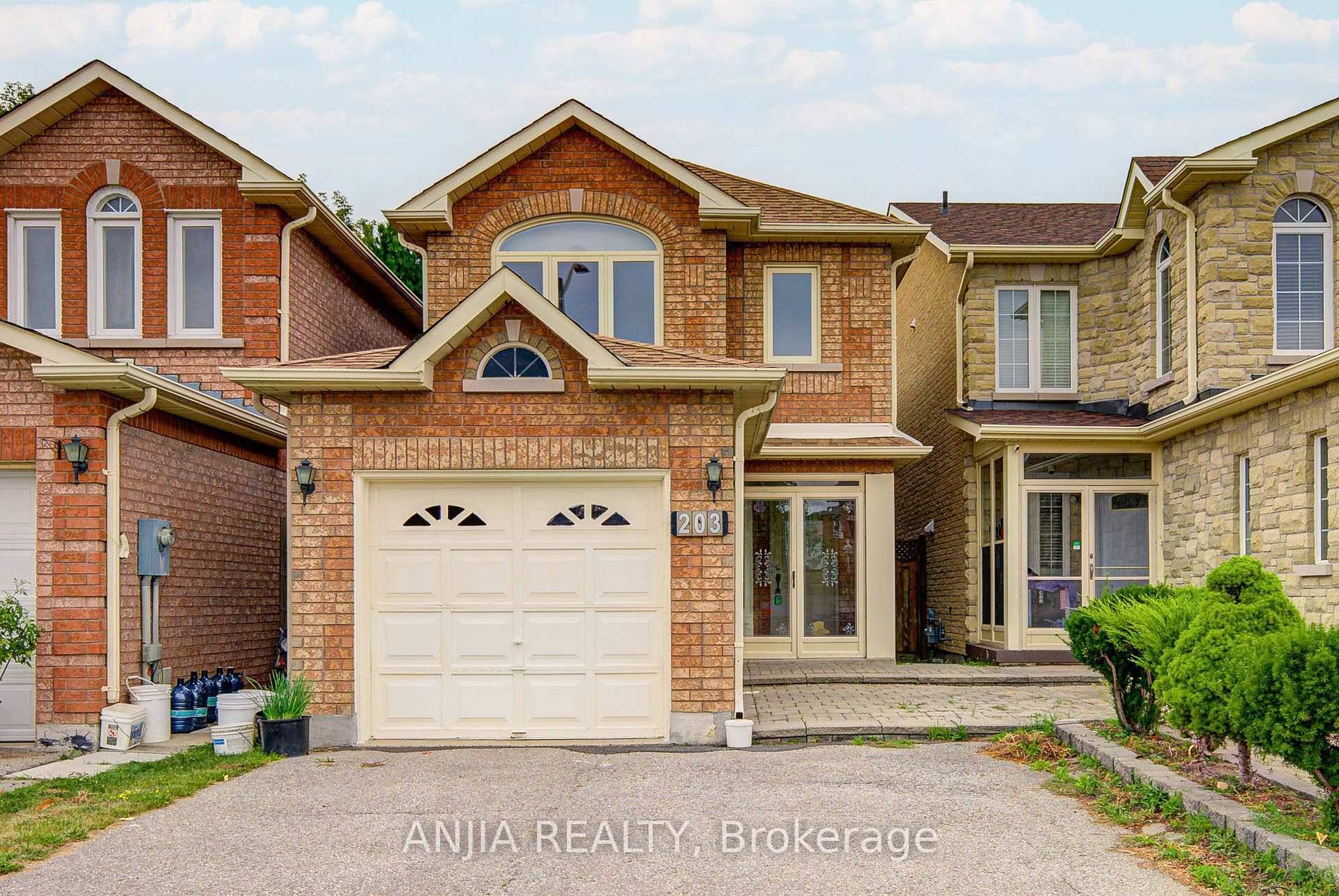 Spacious and bright 3 bedroom detached link home in desirable Milliken Mills West.