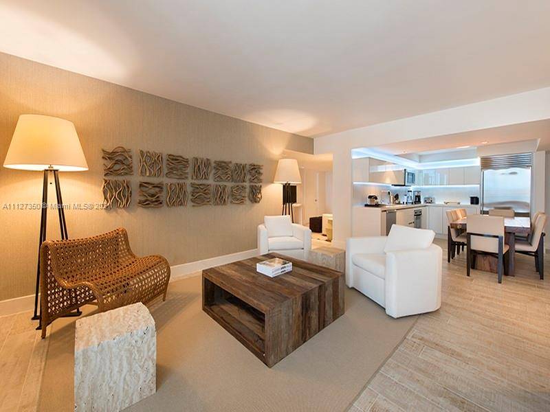 Enjoy direct ocean views from this 2, 233 SF luxury 3 bedroom den luxury condo.