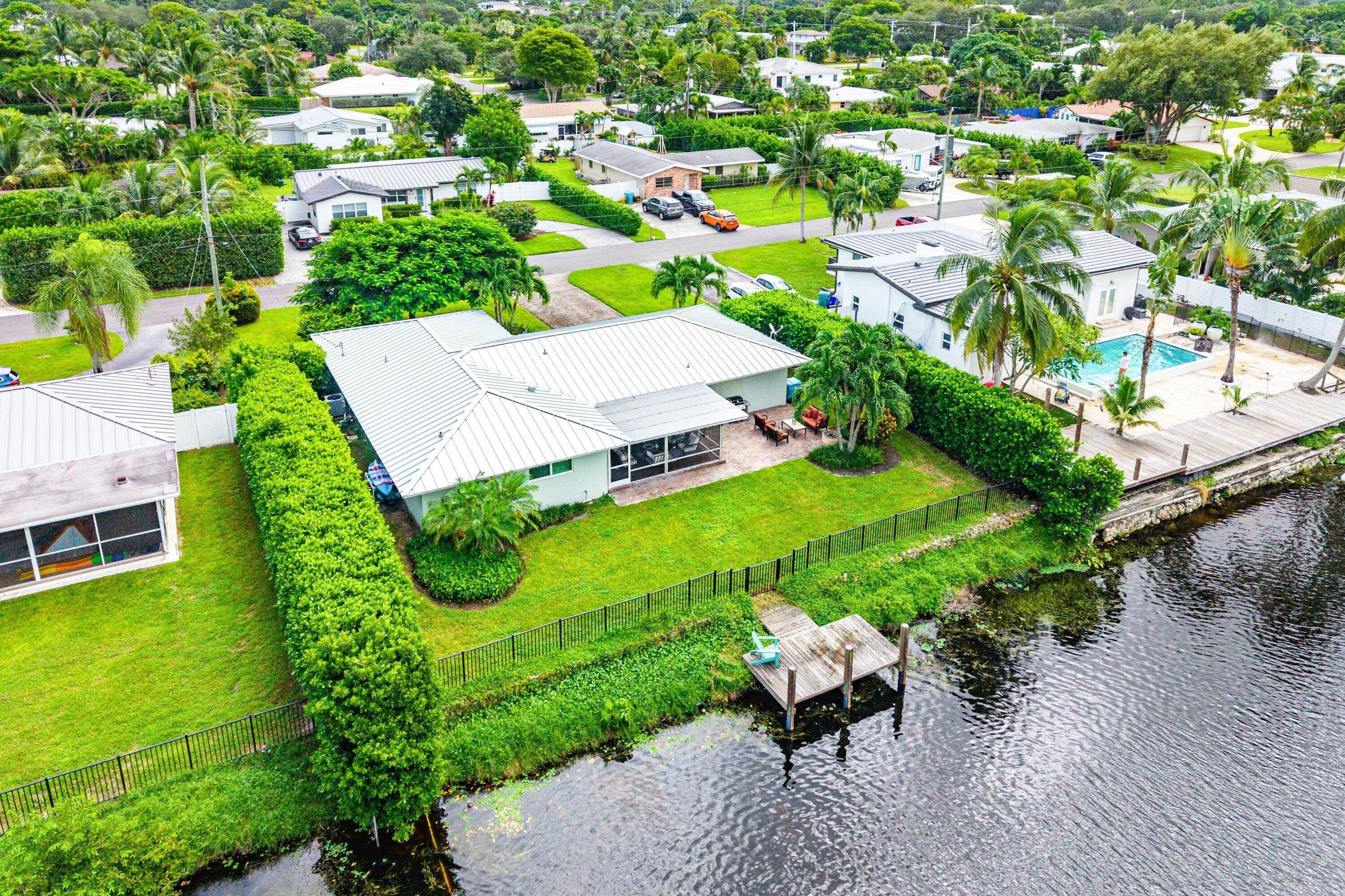 Situated on a large, almost 11, 000 sf waterfront lot, this beautifully kept 3 bedroom 2 bath home has so many wonderful features !