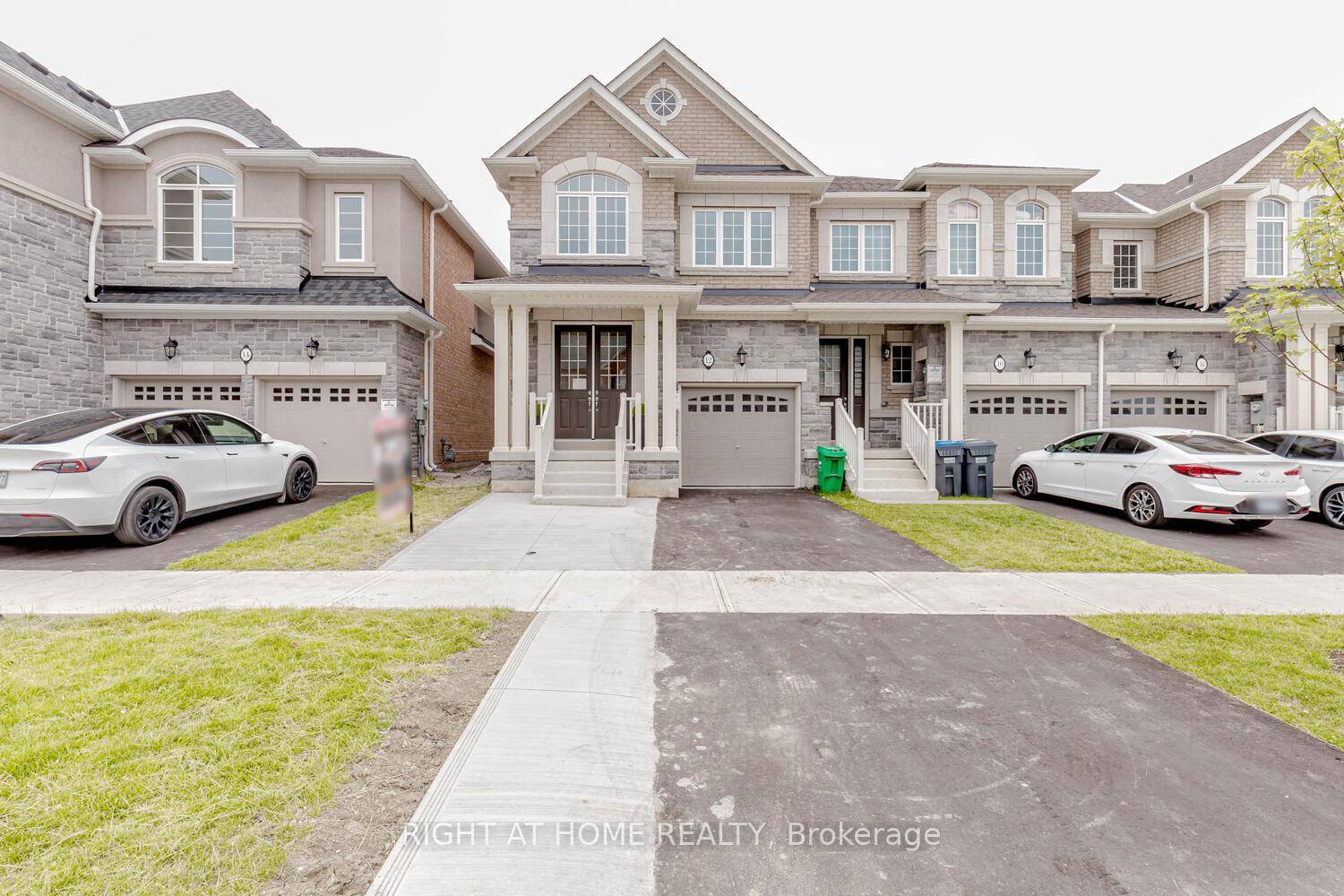 This stunning end unit feels like a semi detached with double door entrance, Welcoming foyer, New house.