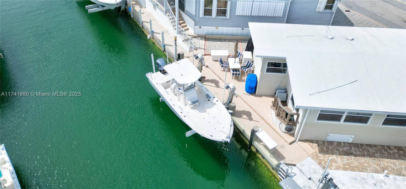 Fantastic investment opportunity 2 Bed 1 Bath Waterfront location With a private oceanfront beach and a 15K LB boat lift, this property is perfect for water enthusiasts.