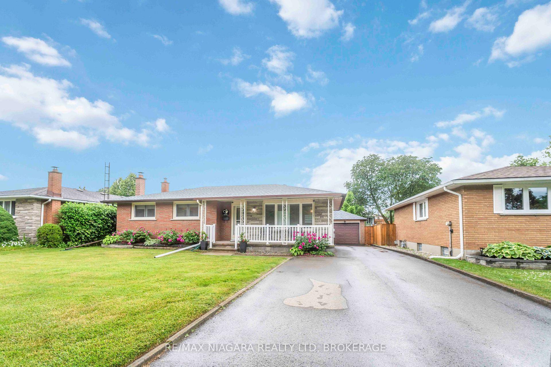 Solid All Brick Bungalow with In Law Potential amp ; Detached Garage.