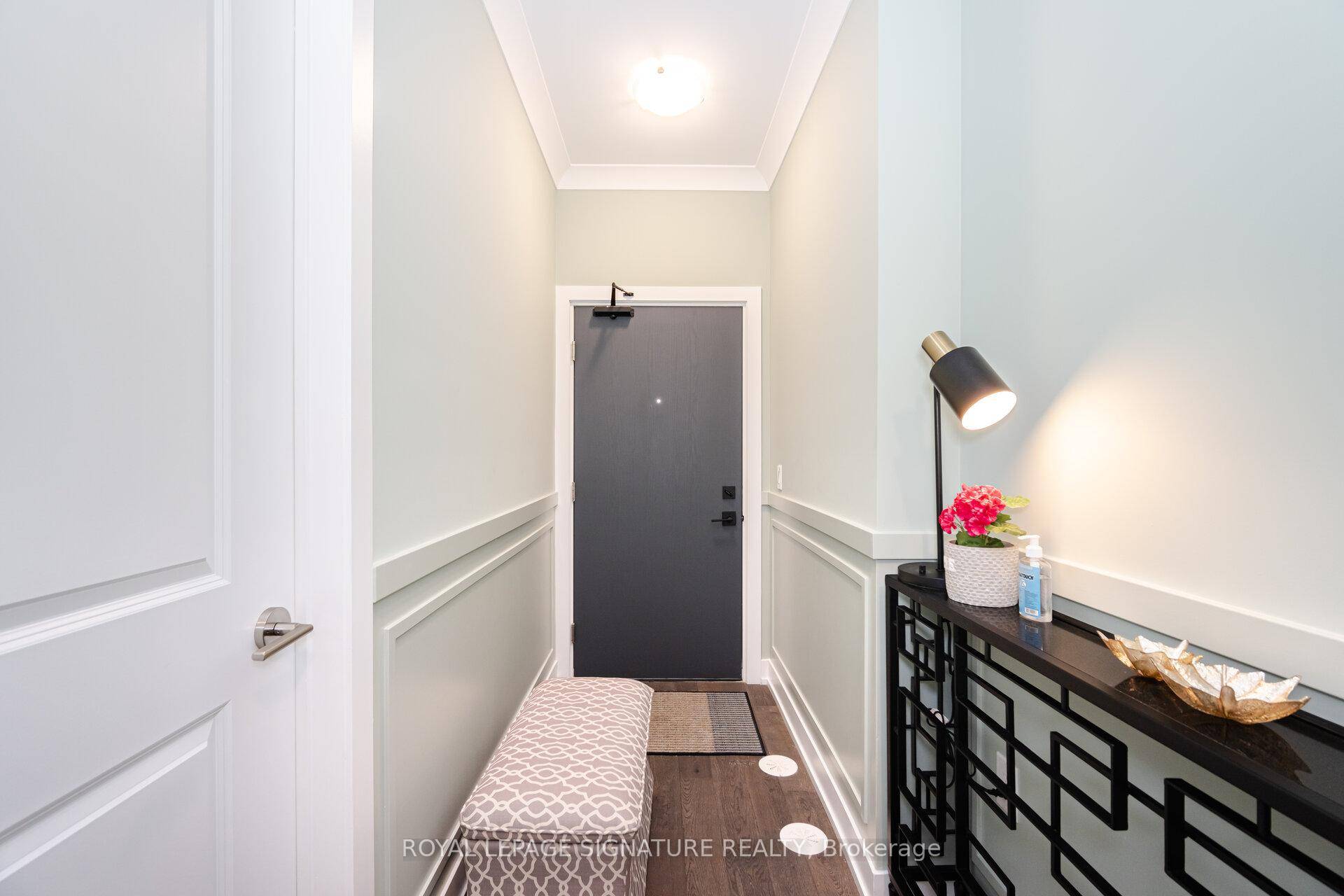 Welcome to this stunning 1 bedroom den townhome by Kingsmen Group, featuring 823 sq.