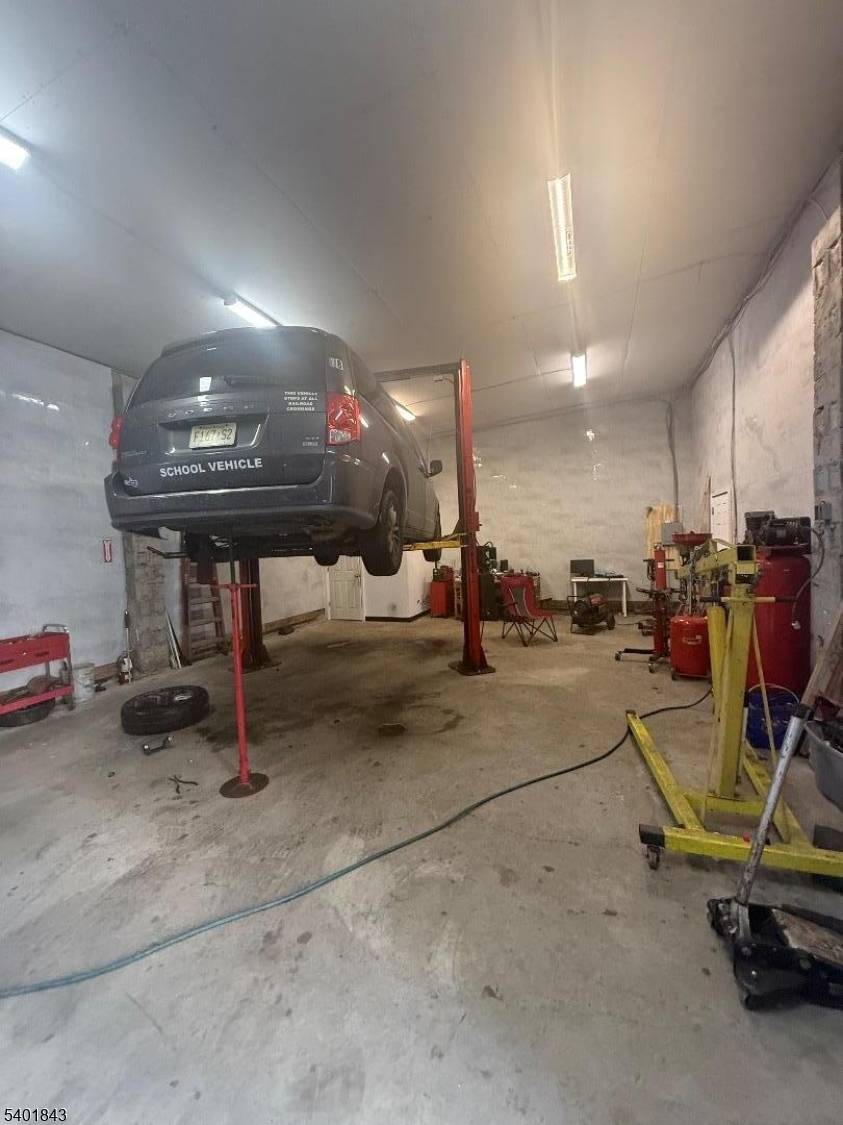 Commercial garage located on a high visibility corner lot in Elizabeth.