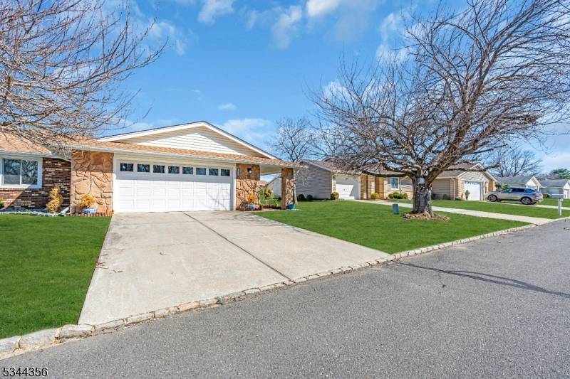 Welcome to this charming, upgraded Master Lodge model, featuring a highly desirable floorplan and an attached garage for added convenience.