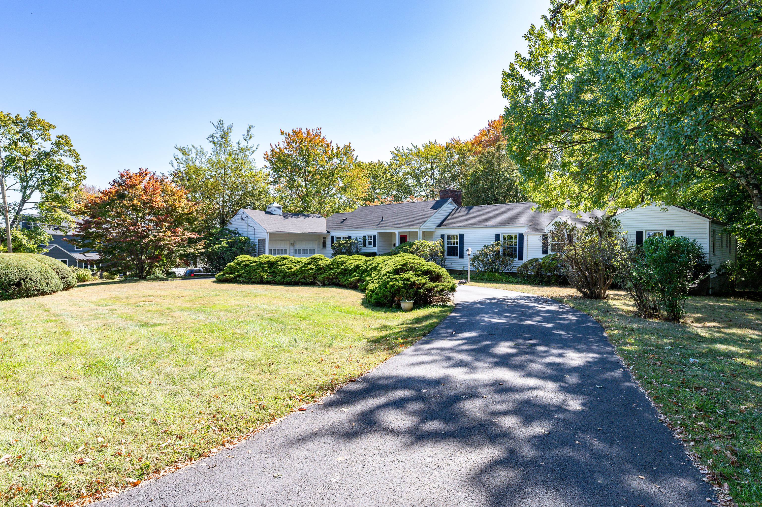 Welcome to 59 Holbrook Drive a rare opportunity to own a sprawling mid century ranch on an oversized.