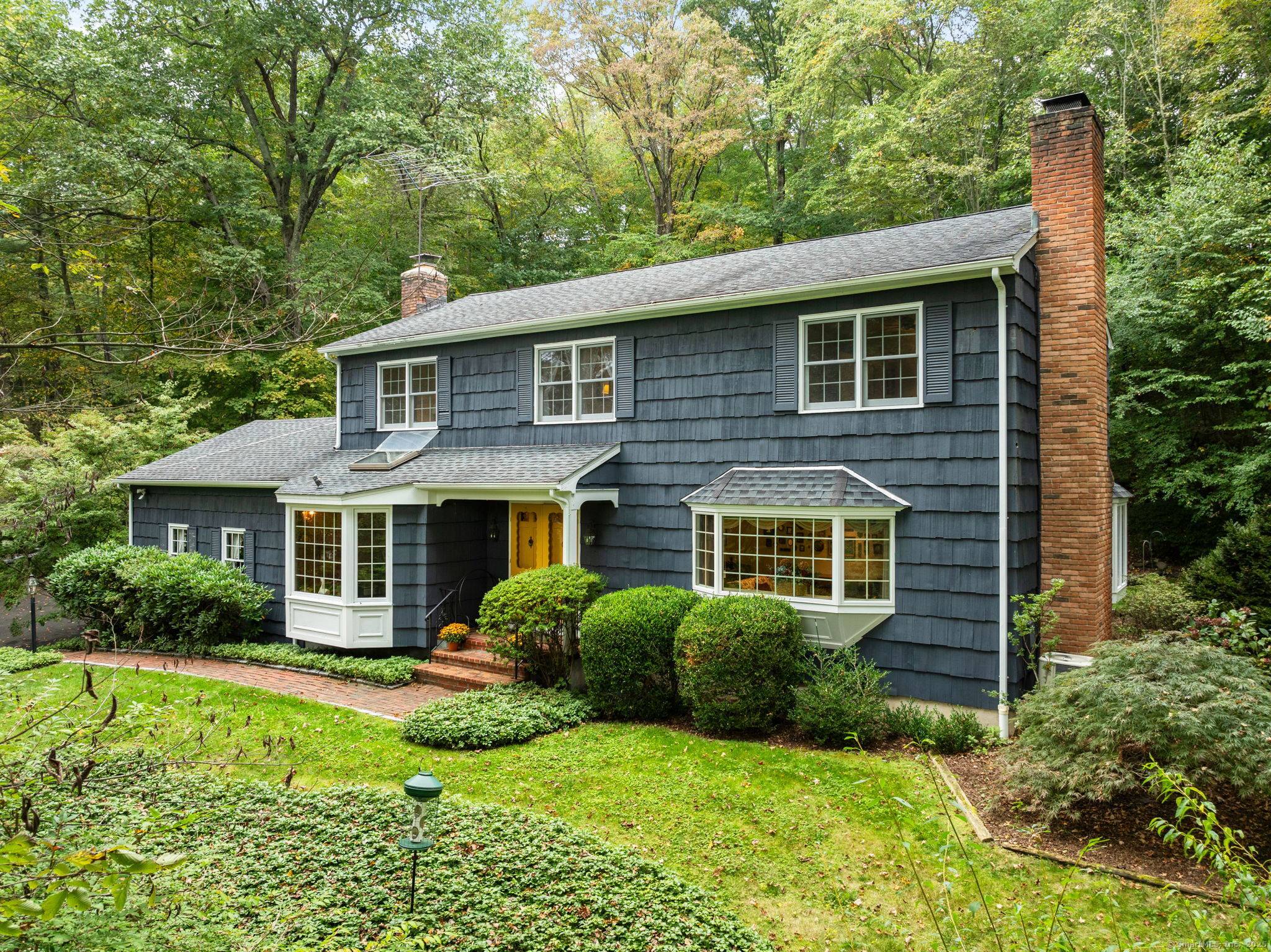 Welcome to this stately, well loved 4 bedroom Colonial set on a beautifully landscaped acre with well proportioned rooms and a thoughtful floor plan.