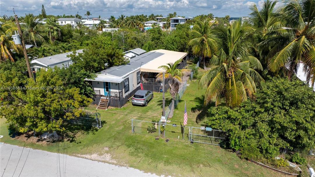 Here's your chance to purchase your own piece of paradise a tucked away, private waterfront oasis in the highly sought after Bermuda Shores subdivision of Key Largo.