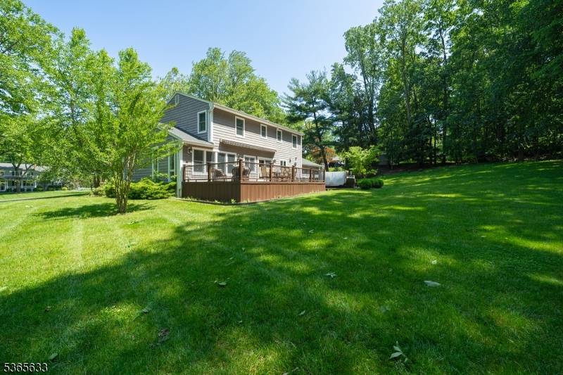 Tucked away on a quiet cul de sac in Holmdel's desirable Heyward Hills, this fully renovated Colonial blends classic charm with modern updates.
