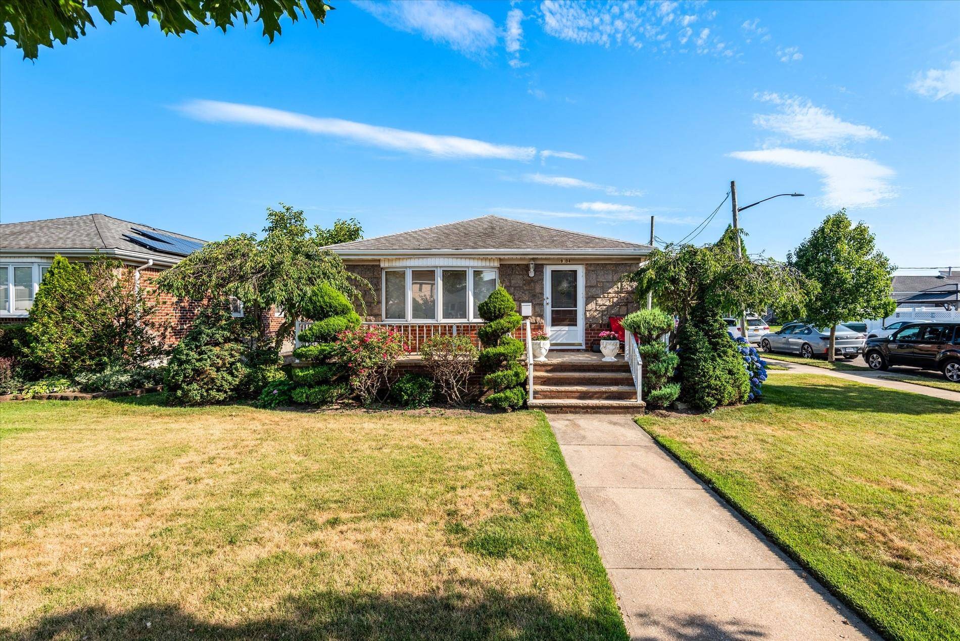 Charming low ranch in the heart of Howard Beach.