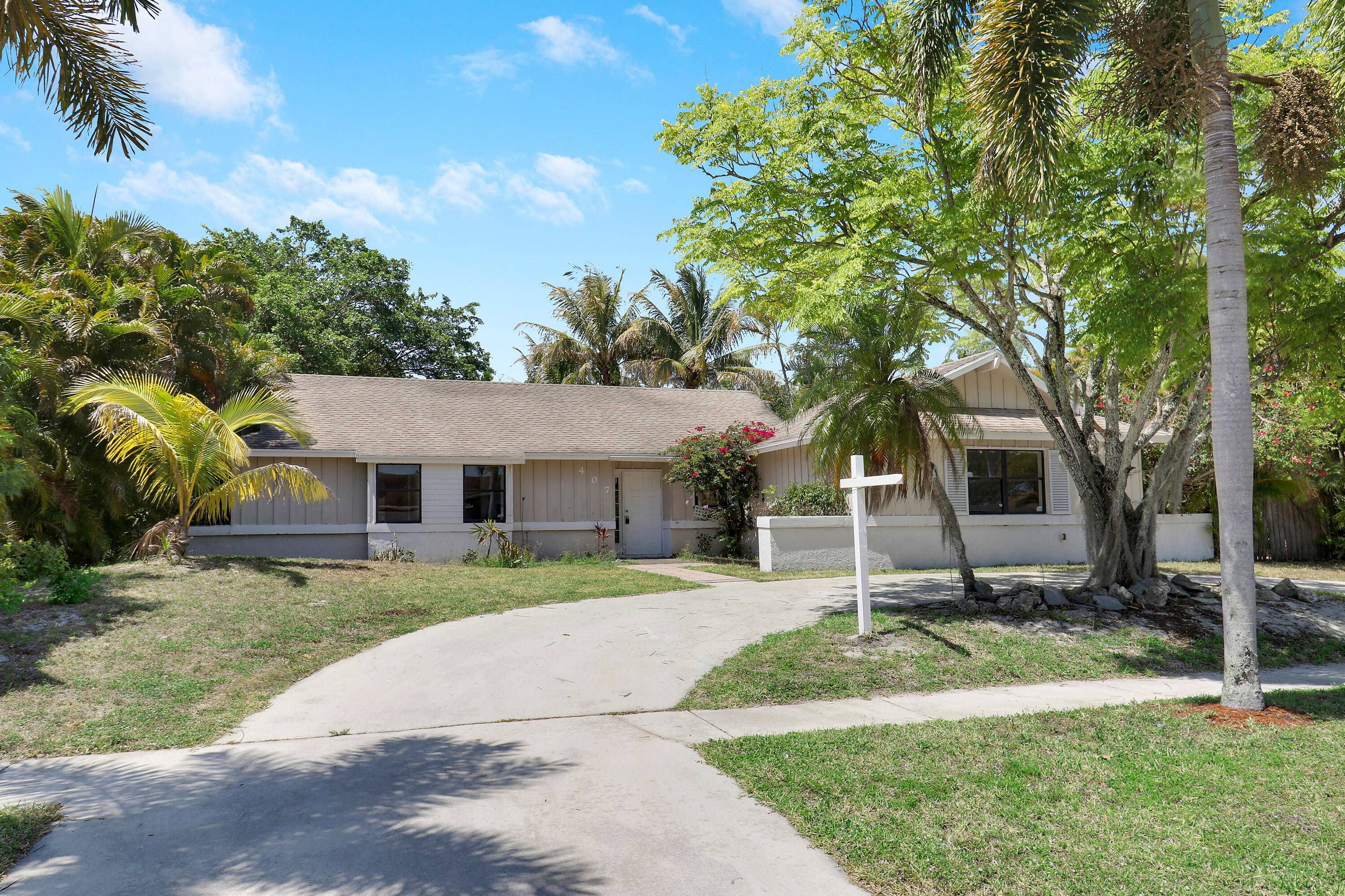 Discover the potential of this spacious 4 bedroom, 2 bath home nestled on a huge lot with endless possibilities.