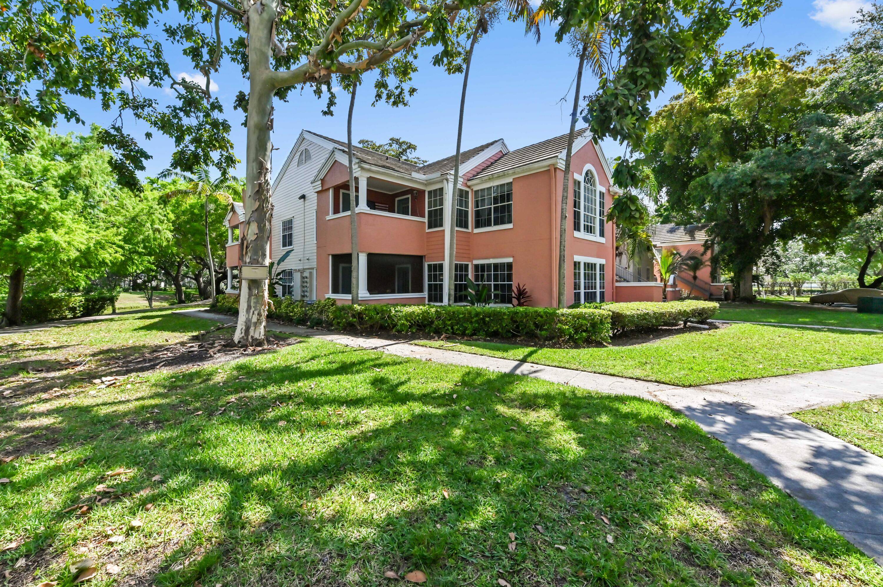 Come discover this lovely FIRST FLOOR 2 Bedroom 2 Bathroom CORNER residence offering beautiful LAKE and GARDENS views !
