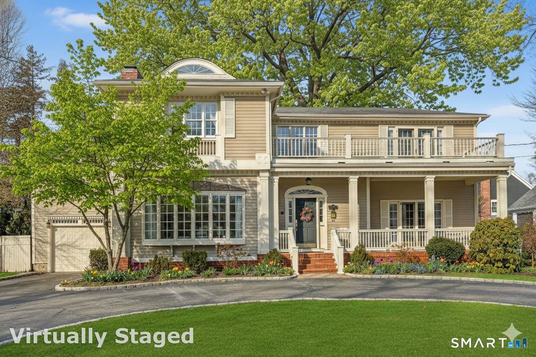 Embrace the timeless elegance and warmth of this home situated in the historic district of Milford.