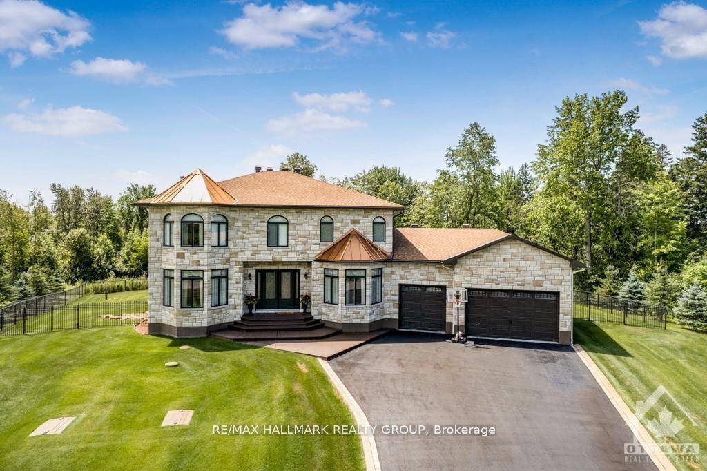 Welcome to 699 Ballycastle Crescent A Signature Estate in Emerald CreekNestled in the prestigious Emerald Creek Estates, this custom built luxury home sits on one of the last premium lots ...