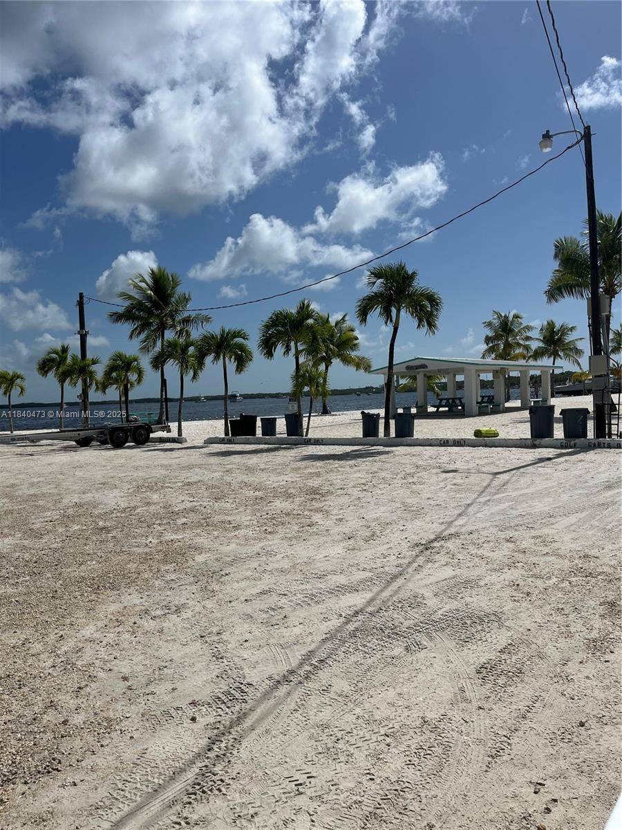 Imagine walking up to breathtaking water views down the street from this property which offers a private beach and 2 community boat ramps with a voluntary minimal YEARLY fee.