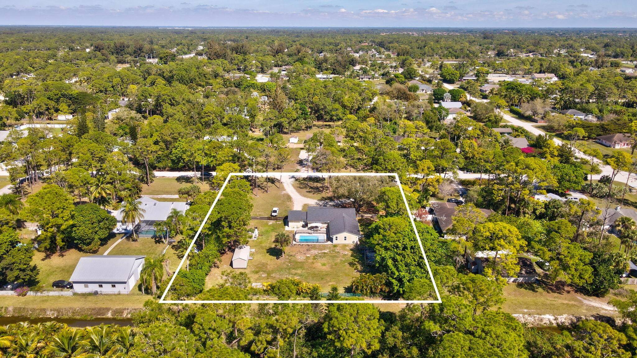 Discover the perfect blend of space, style, and serenity in this beautifully updated 5 bedroom, 3 bathroom home, set on a sprawling 1.