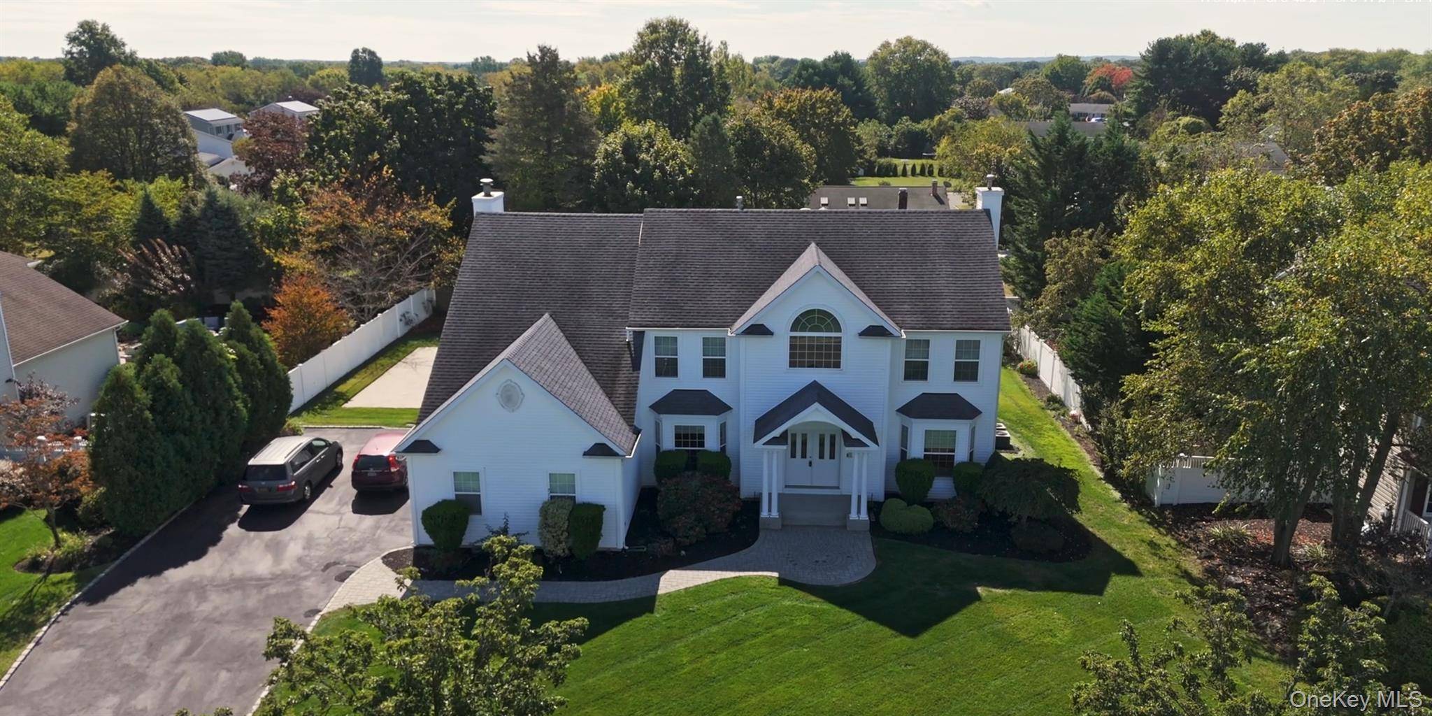 Welcome to this beautifully expanded Oxford II model, nestled in a sought after Island Estates development and built in 2005.