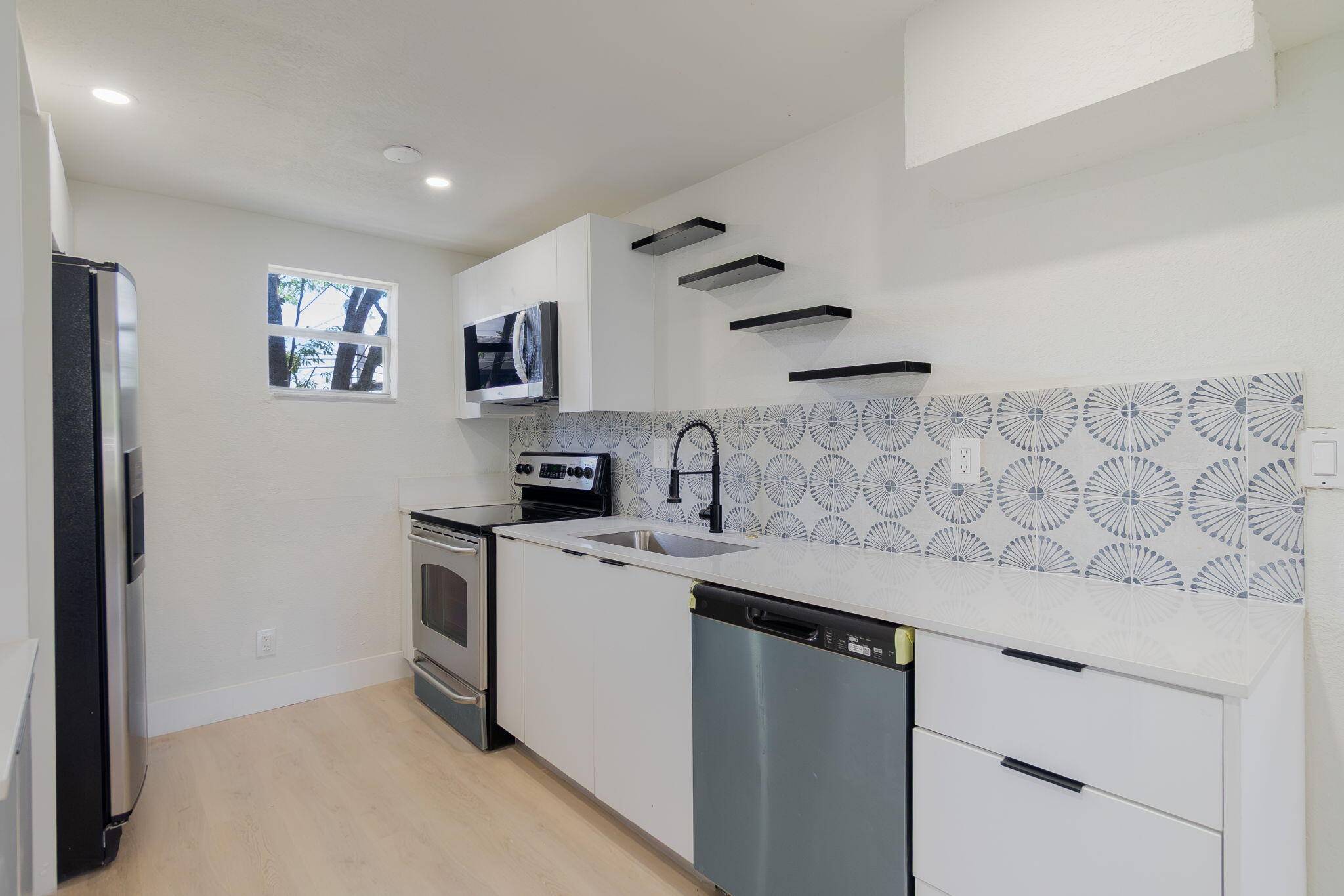 Welcome to 1108 W 33rd Street in Riviera Beach a beautifully renovated 3 bedroom, 2 bath home that's truly move in ready.