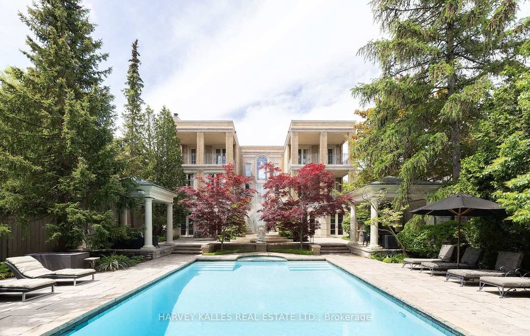 Majestically situated on one of Forest Hills most prestigious streets, this captivating residence masterfully designed by world renowned architect Gordon Ridgely exemplifies timeless elegance and impeccable craftsmanship.