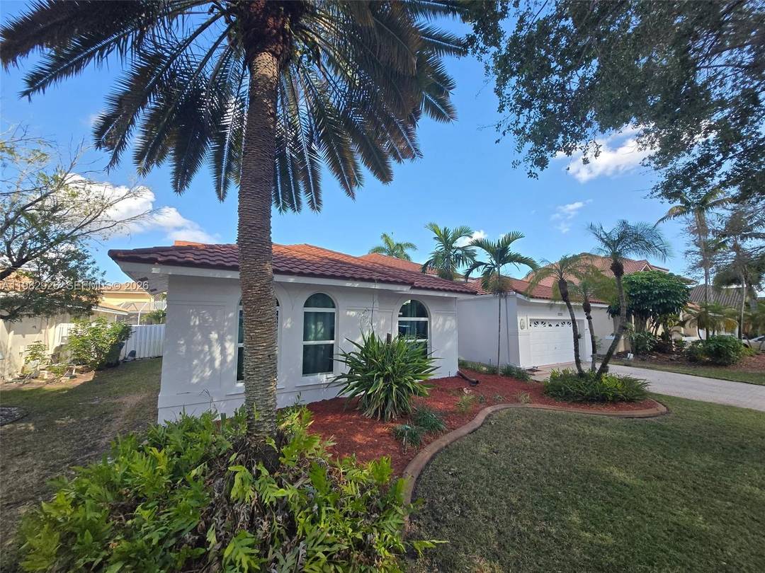 Welcome to your next 4 bedroom, Gated Pool Home w Private Backyard in Malibu Pointe in Silver Lakes.