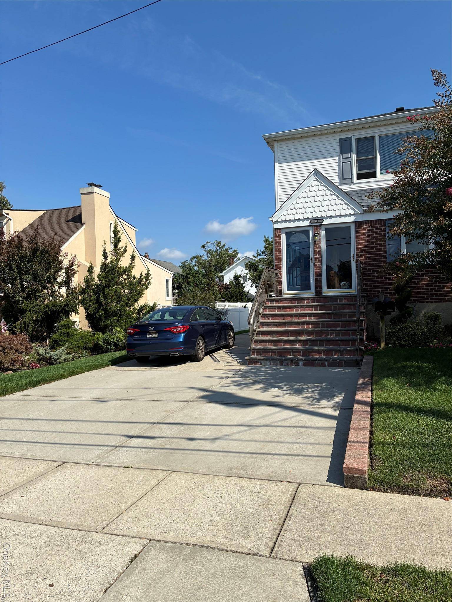 Welcome to this beautiful 3 bedroom, second floor apt in a legal 2 family home.