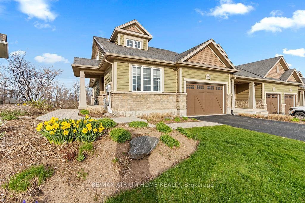 Located In The Golf Community Of Cobble Beach, This Spacious End Unit Bungaloft Townhome Is 1679 Sq Ft Above Ground With A Fully Finished Walk Out Basement.